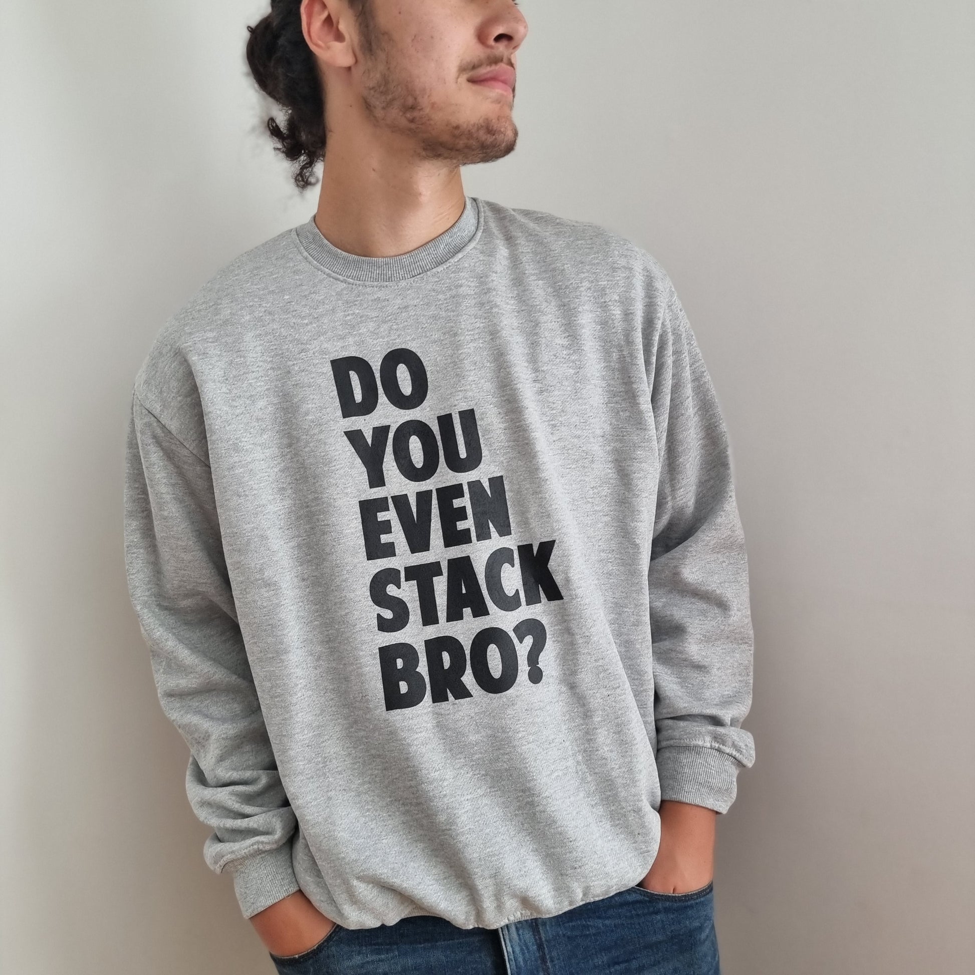 UNISEX Do you even stack Bro? Is a quirky question printed in big bold capital print. Black on grey. Oversized fit. Fleecy lined. Back print is of a single chair.