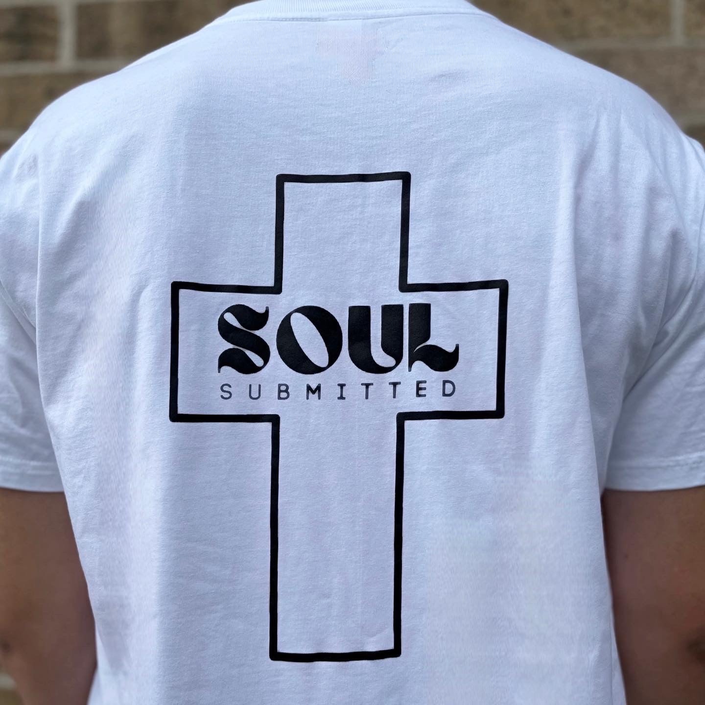 This pic is of a white tee with the back print in black. Soul Submitted inside the cross ( our logo. ) 